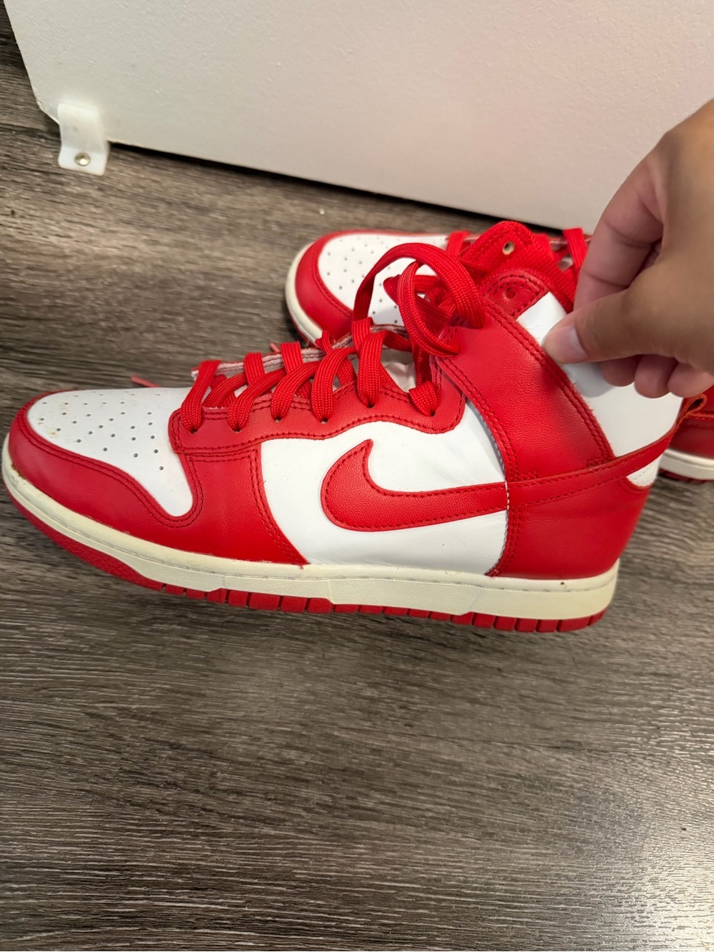 Red and white Nike dunks high top